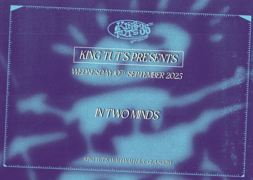King Tut’s Presents: In Two Minds in white writing on blue backgroundx